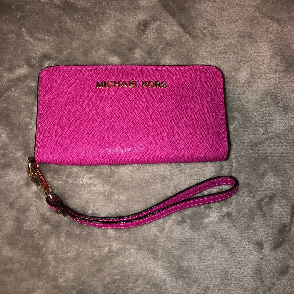 Magenta Michael Kors wristlet